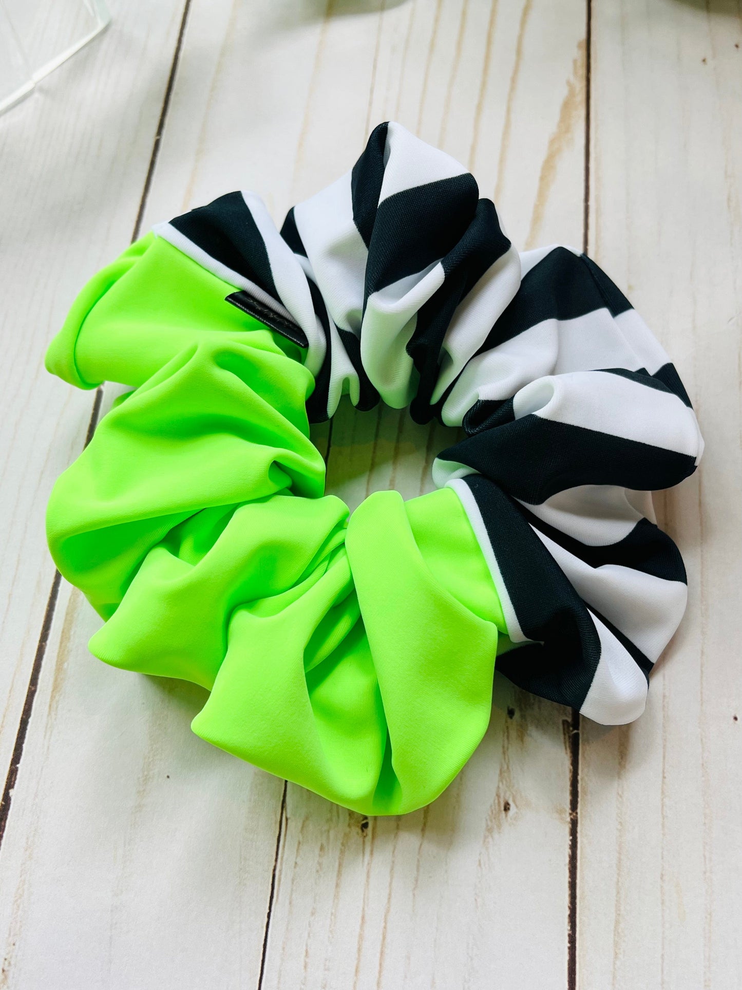 Macie | neon green & black and white striped scrunchie