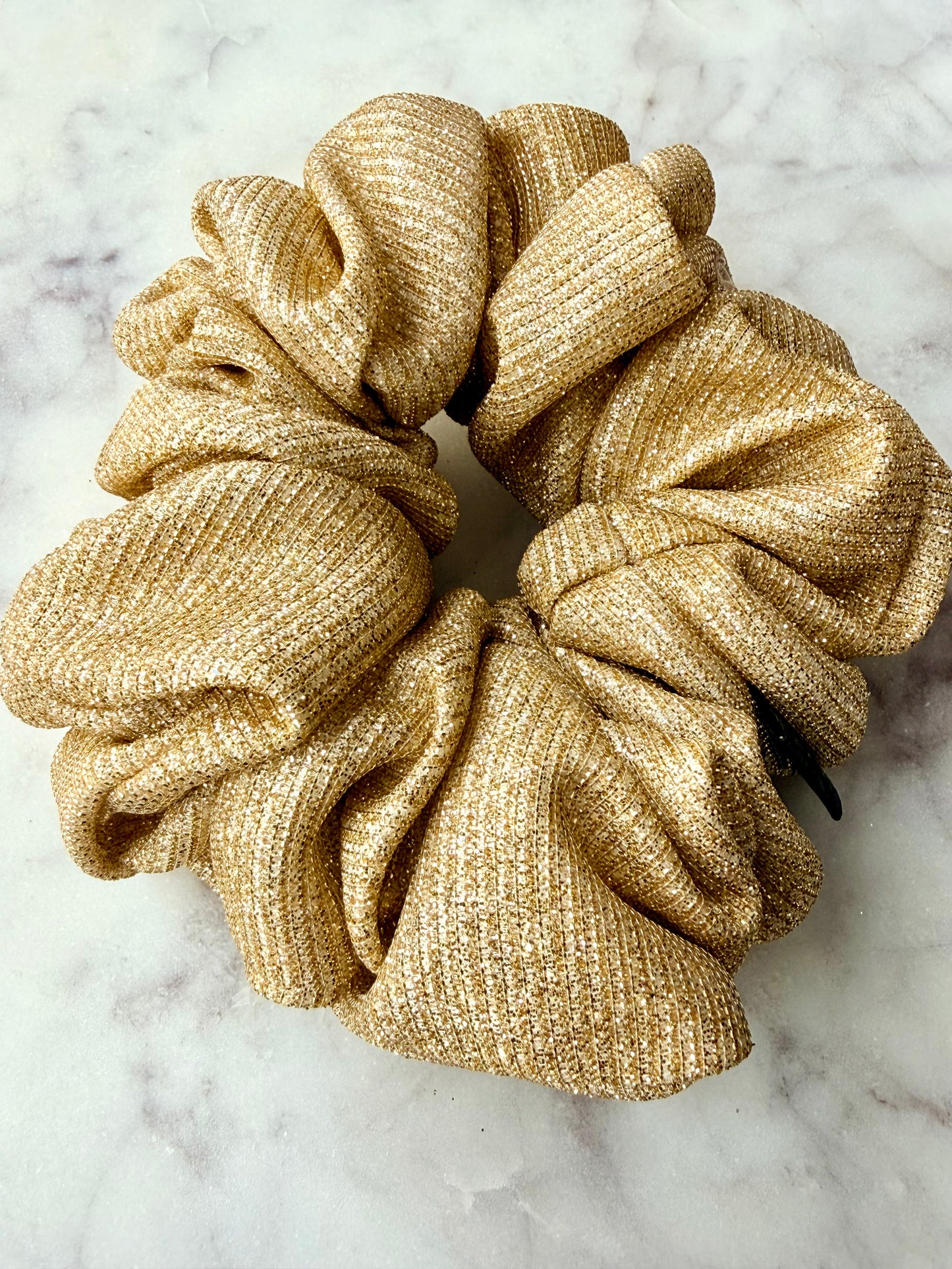 Eve. | Light gold glitter scrunchie.