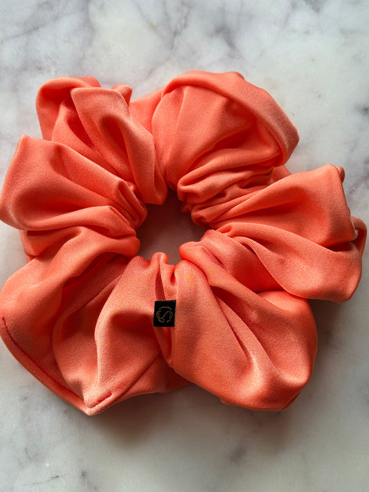Aria. | a cantaloupe shiny Miliskin spandex scrunchie for gymnasts, dancers, cheerleaders and more.