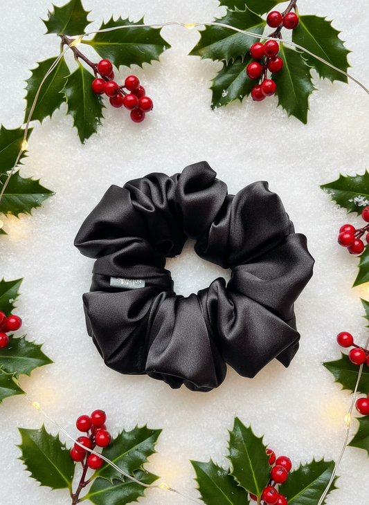 Addison. | a black satin scrunchie.