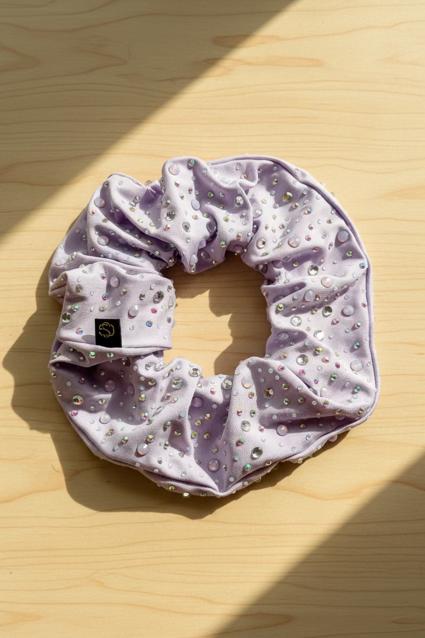 Avery. | A pastel lavender rhinestone scrunchie for dancers gymnasts and cheerleaders