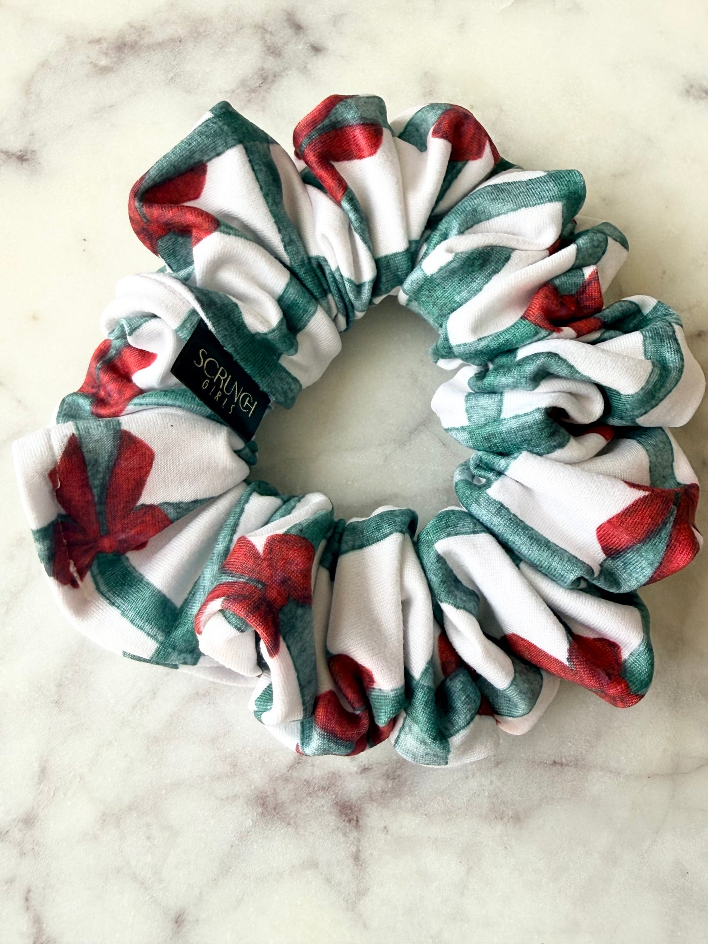 Multicolored scrunchie on a marble surface