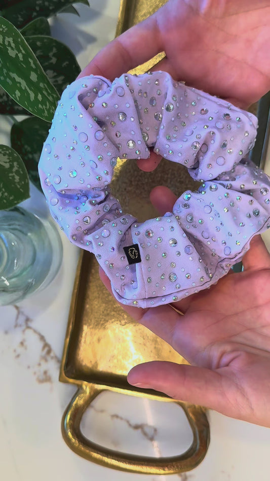 Avery. | A pastel lavender rhinestone scrunchie for dancers gymnasts and cheerleaders